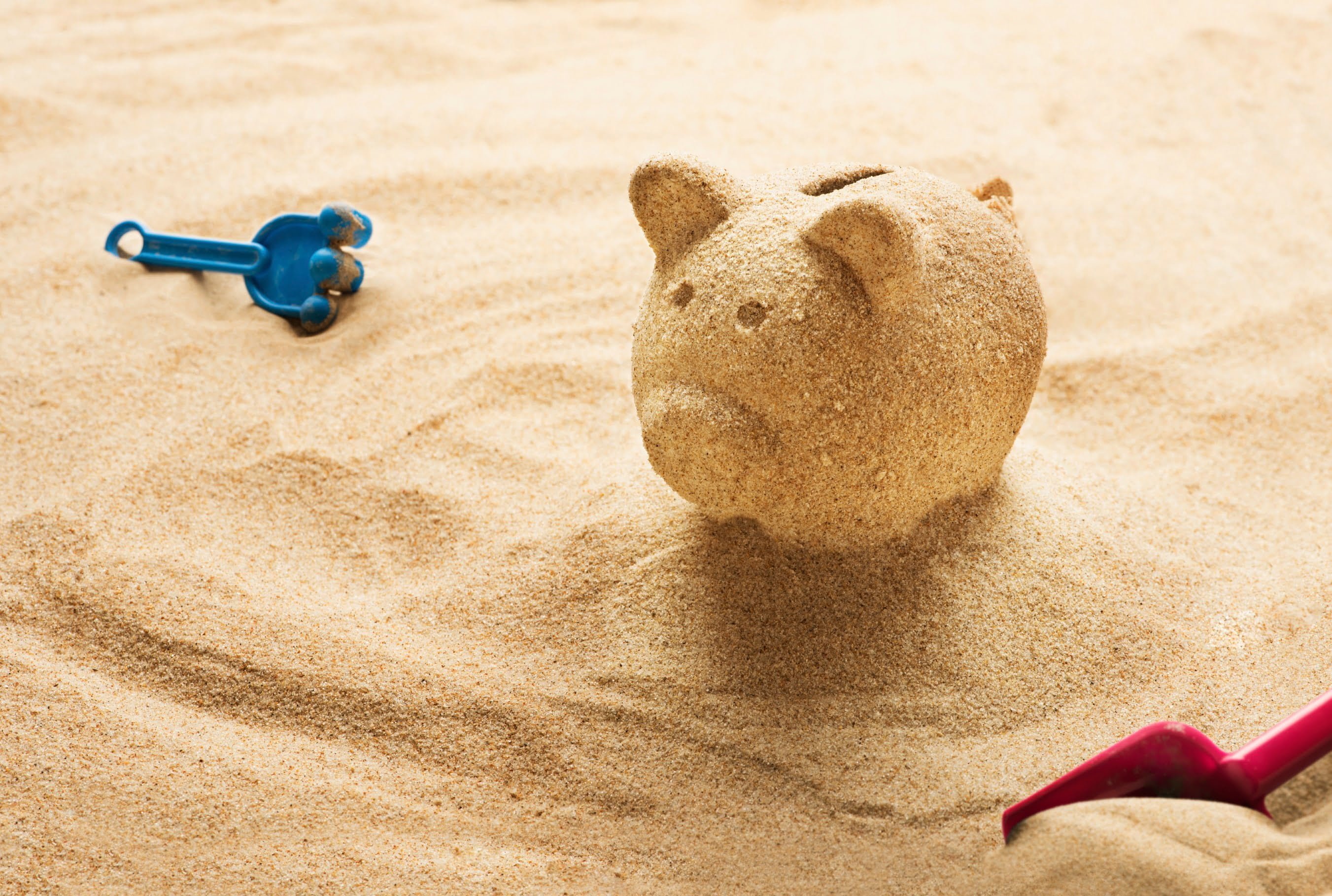 Offshore Banking - Piggy Bank in the Sand