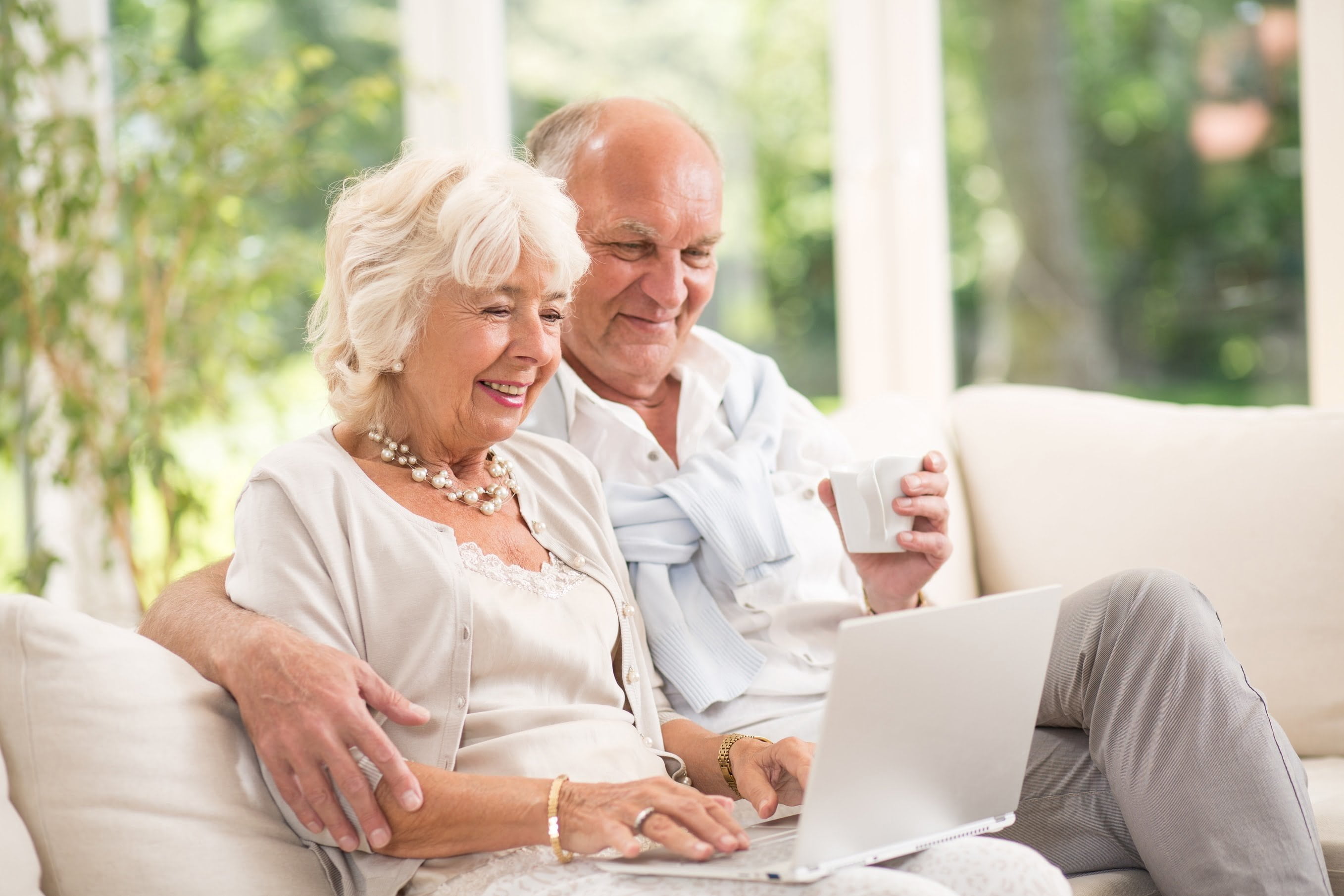 Retirees with Laptop